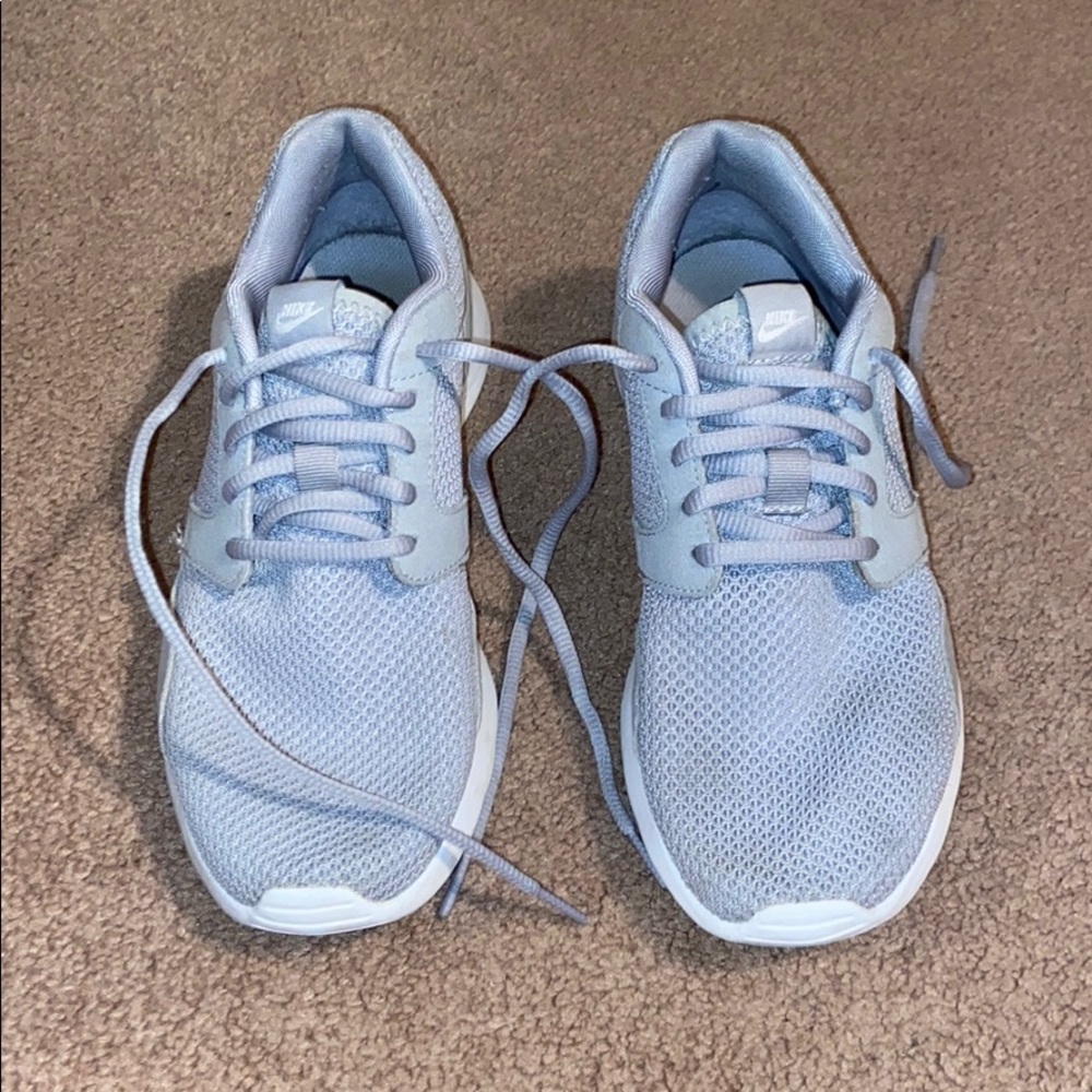 Grey Nike tennis shoes